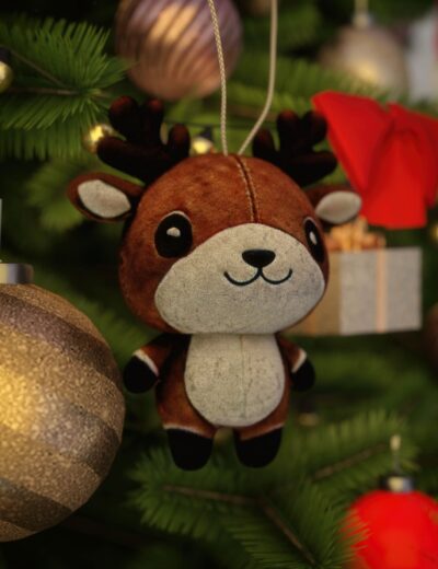 Cute reindeer plush ornament for Christmas tree decorations, featuring a friendly face, antlers, and cozy details, perfect for holiday festive decor.