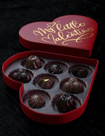 Delicious assorted chocolates in a heart-shaped Valentine’s Day box, perfect for romantic gift-giving, showcasing detailed 3D Daz3D asset renders.