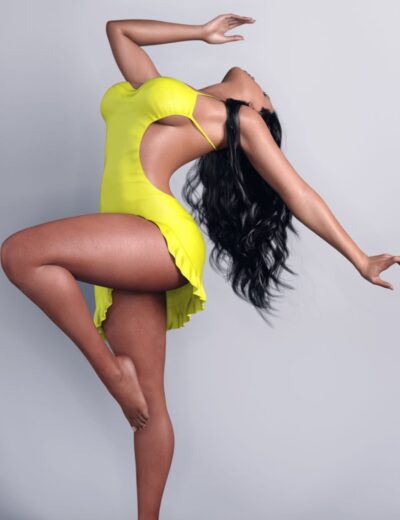 Vibrant yellow cut-out dress showcasing stylish fashion and modern design, perfect for summer or special occasions, emphasizing elegance and contemporary fashion trends.