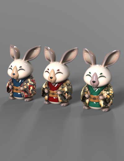Three colorful ceramic rabbit figurines in traditional kimonos with joyful expressions and intricate detailing.
